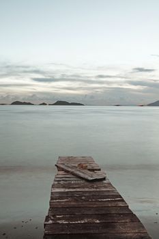 Isolated and lonely pier in low saturation style