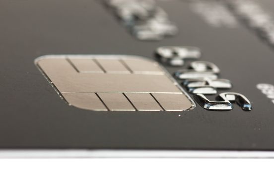 Macro view of credit card with microchip. Narrow focus.