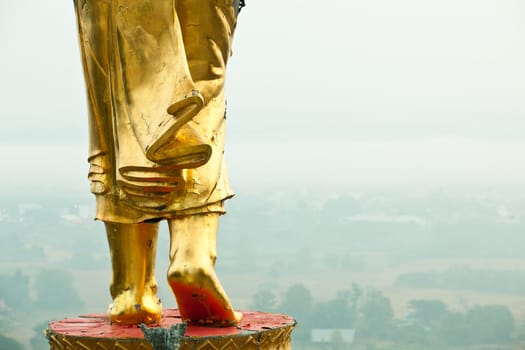 Walking Buddha statue at northern of thailand
