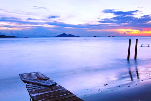 Sunset along a wooden pier