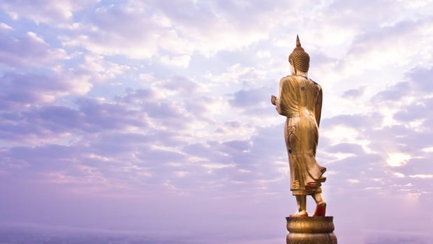 Walking Buddha statue at northen of thailand