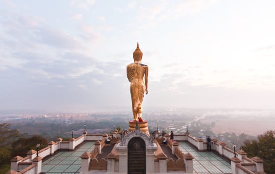 Walking Buddha statue at northen of thailand