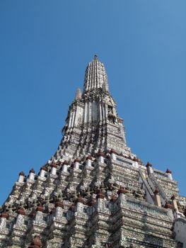 Phar Prang in Wat Arun (Temple of Dawn) decorate with faithful statue, Bangkok, Thailand