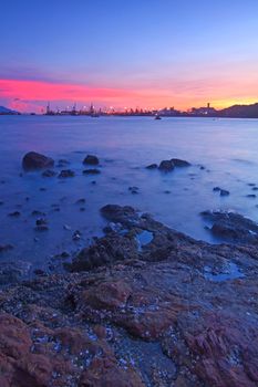 Sunset along the coast, long exposure of rocks