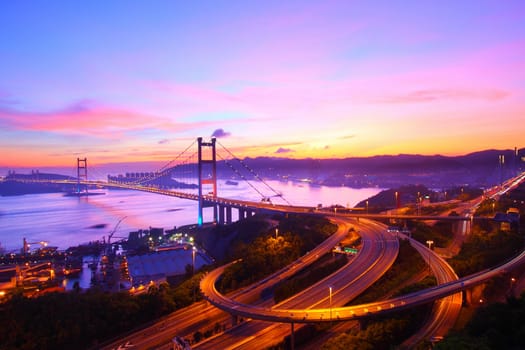 Tsing Ma Bridge in Hong Kong at sunset time