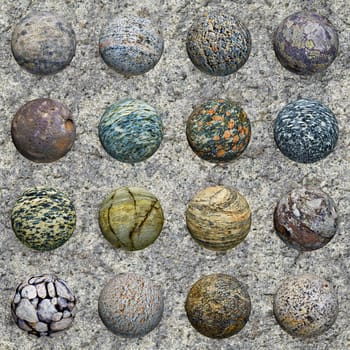 A set of stone balls against a granite wall - seamless texture