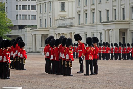 Grenadier guards at attention while inspection by officers