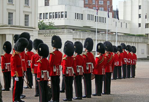 Grenadier guards at attention while inspection by officers
