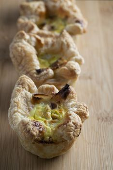 Fresh pastry filled with eggs cheese and leeks.