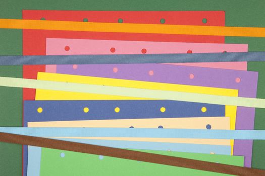 colorful paper notes with ribbon