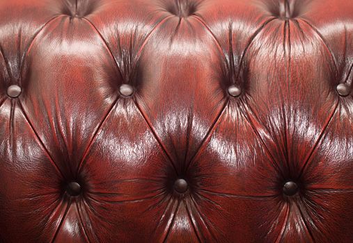 red-brown button-tufted leather background