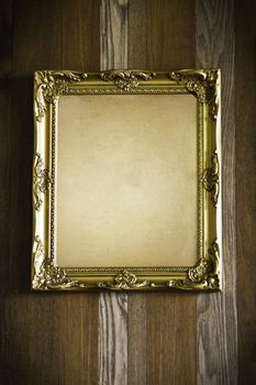 Photo frame on wood texture
