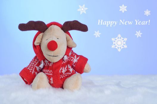 Christmas cards - toy reindeer dressed in a red sweater
