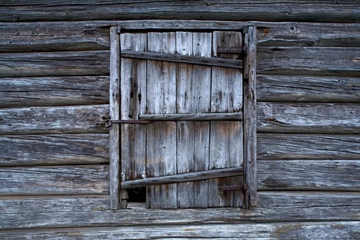 Old wooden door with rosty lock