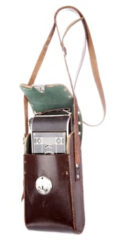 Old photo camera in leather case 