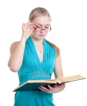 A young girl in glasses with a book isolated on white with clipping path