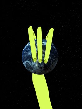 Conceptual image showing an alien hand that is grabbing the world.