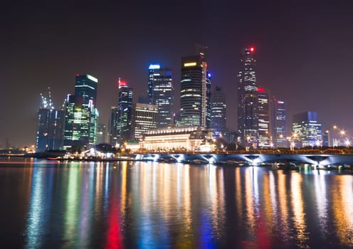 Colorful light at sigapore city that reflew on the river.