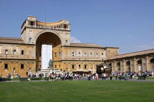 The courtyard of the Vatican Museums featuring the Sphere within Sphere by Arnaldo Pomodoro.