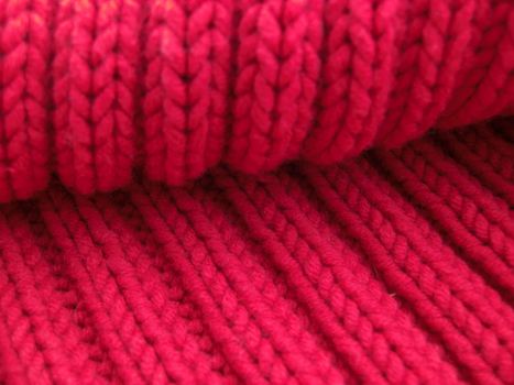 detail of a red cardigan