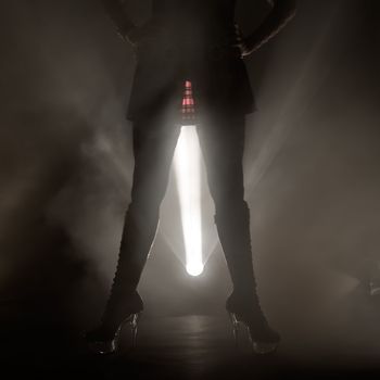 Light painted silhouette of a young alternative woman