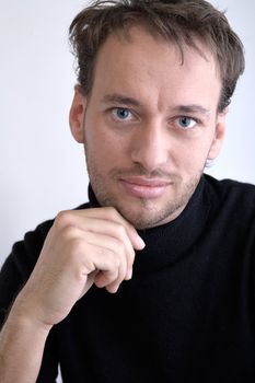 Studio portrait of a young adult man