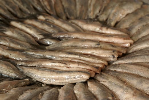 Dish full of fresh herring.