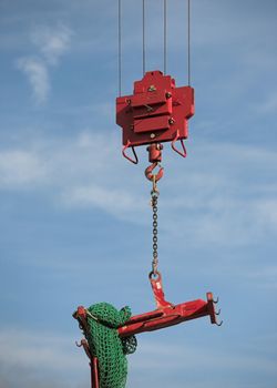 Crane lifting load on a building site