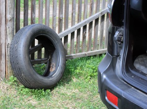 Tyre cover, rubber,  luggage carrier,  car,  fence,  grass, 