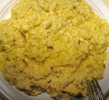 typical italian rice cooked rositto with zaffron