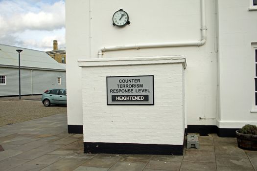 Terrorism warning sign posted in military yard