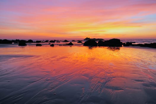 Boulders on the seashore in early morning