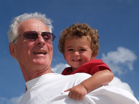 Two generations, grandfather and grandson enjoying the outdoors together.