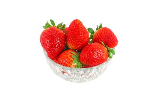 Strawberries in a glass bowl isolated on white