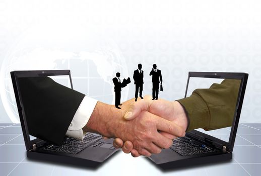 Hand shake between a businessman and a laptop