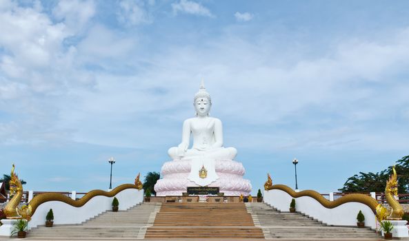 Buddha image and blue sky
