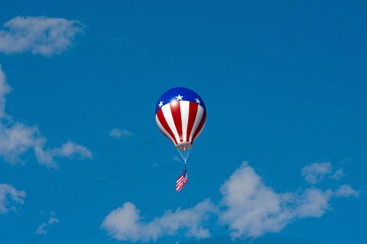 balloon against blue sky in red white and blue