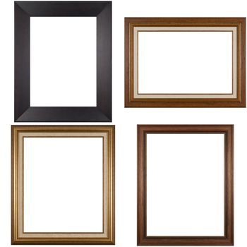 Four antique picture frames isolated on white background.