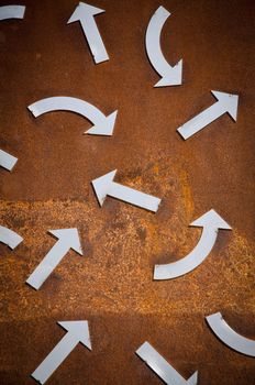 Rusty turn arrow signs background.