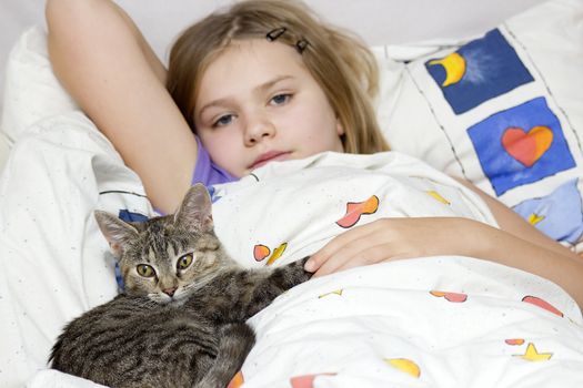 little girl and kitten