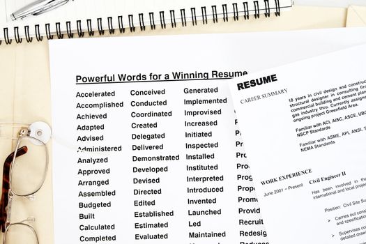 Powerful words for winning a resume concept.