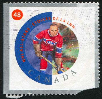 CANADA - CIRCA 2002: stamp printed by Canada, shows hockey player, circa 2002