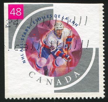 CANADA - CIRCA 2003: stamp printed by Canada, shows hockey player, circa 2003