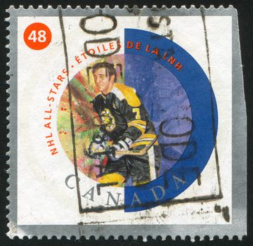 CANADA - CIRCA 2002: stamp printed by Canada, shows hockey player, circa 2002