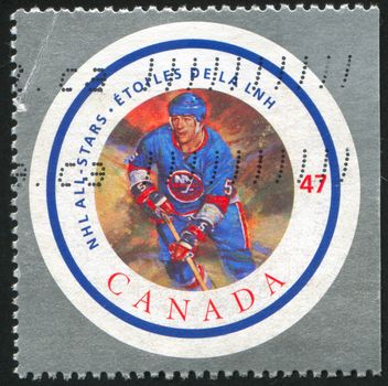 CANADA - CIRCA 2001: stamp printed by Canada, shows hockey player, circa 2001