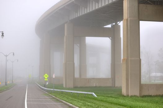 Buffalo New York Skyway bridge leading into downtown Buffalo with fog.