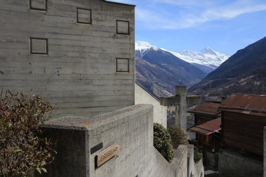 church and mountains