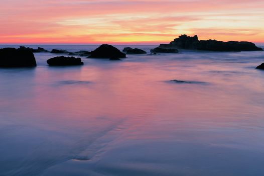 Boulders on the seashore in early morning