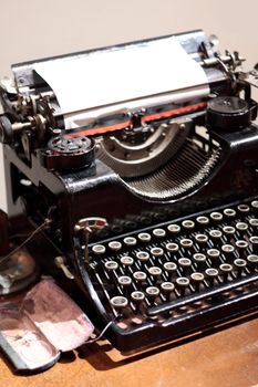 Antique type writer on table