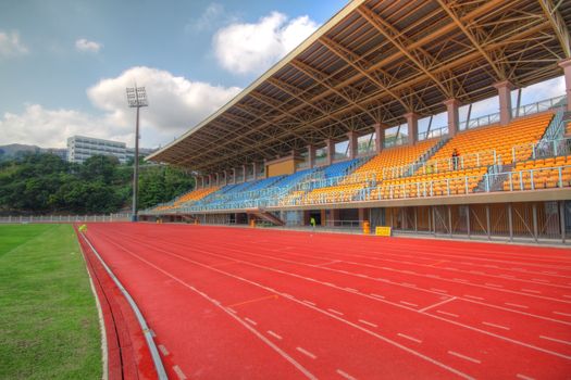 landscape of Coach and reserve benches with seats in football stadium 